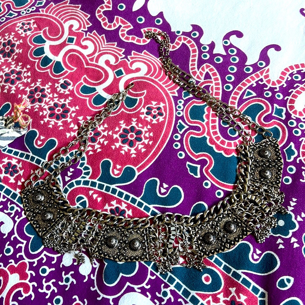 Metallic Silver free people belt 36 in long shown in video/14 in the front part